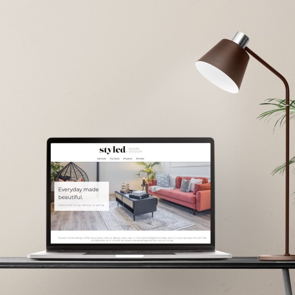 styled home design website on mac laptop