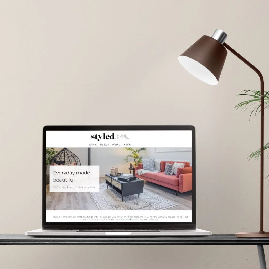 styled home design website on mac laptop