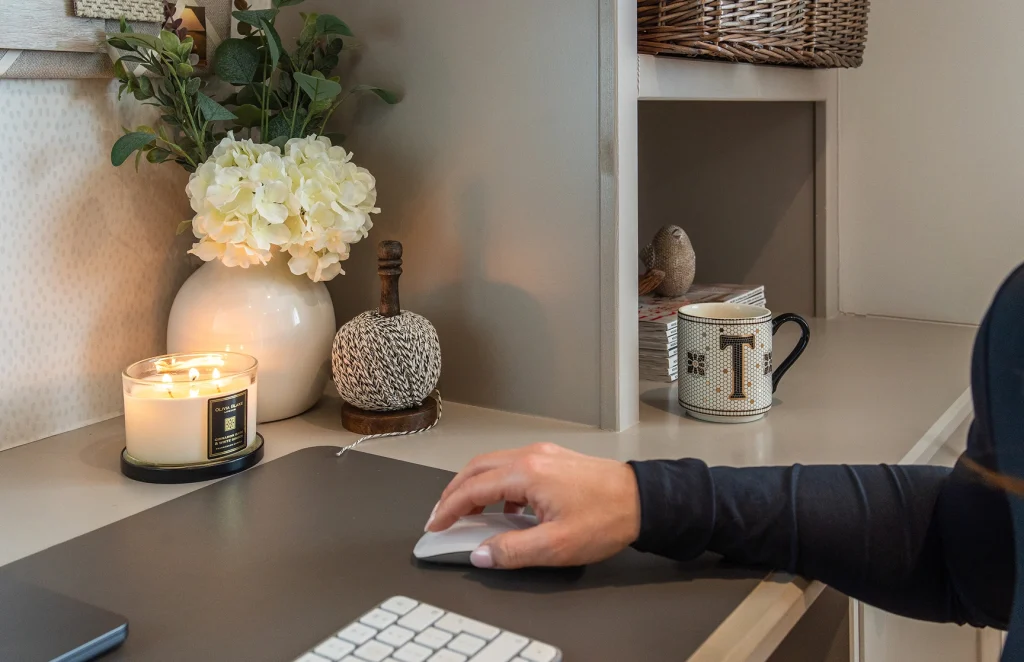 Natasha king reaching for her computer mouse