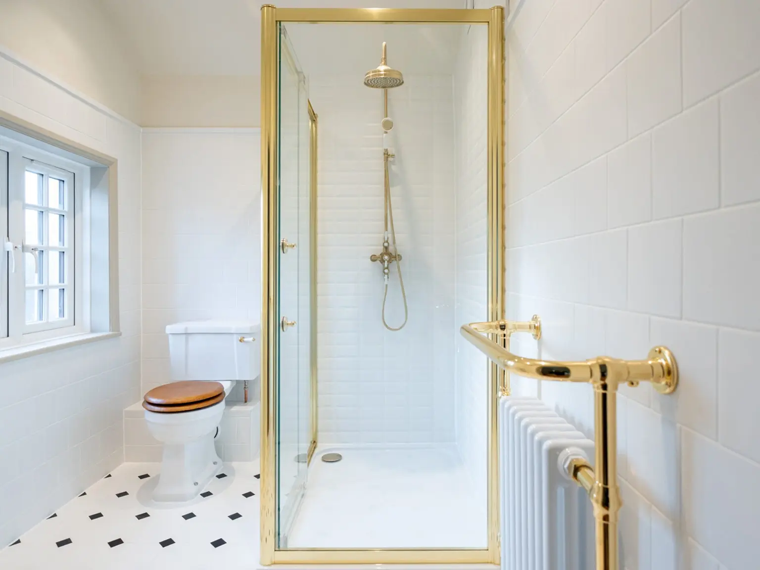 the-story-behind-styled-home-design-journal-01 Traditional bathroom designed by Styled Home Design, with a Burlington pedestal basin and taps, a framed shower screen with Tavistock Lansdown shower kit, Appleton Brooks tiles and a heated towel rail, painted in Farrow & Ball School House White and Drop Cloth